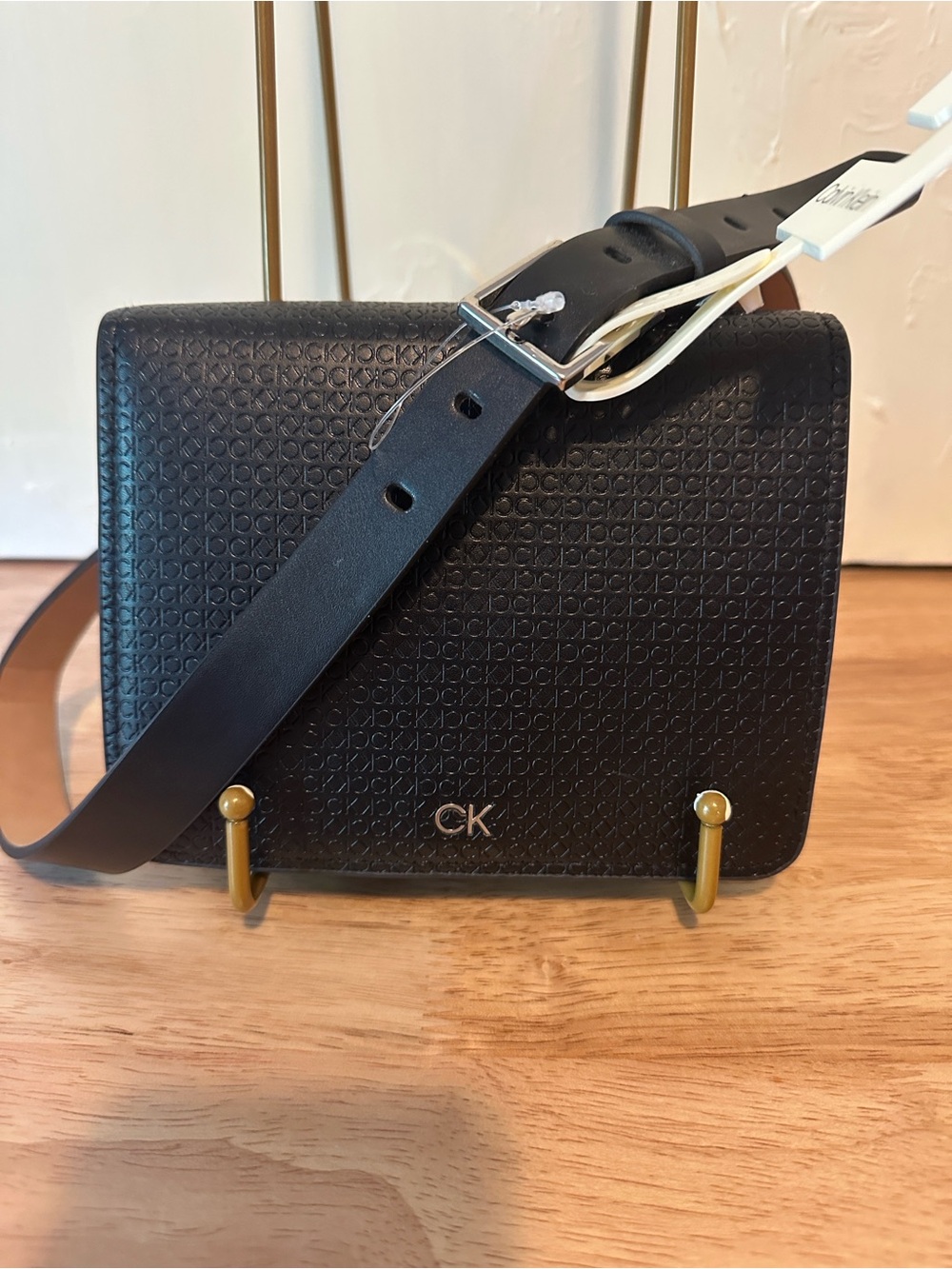 Calvin Klein Black Logo-Embossed Leather Messenger Bag